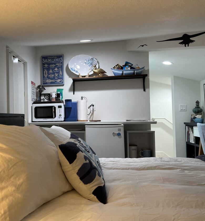Detached bedroom above garage with kitchenette.