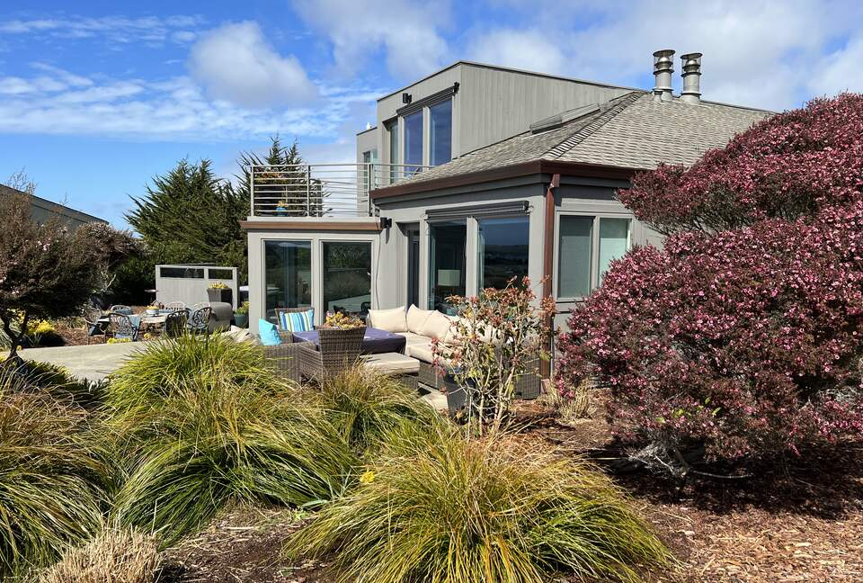 Detached bedroom above garage with kitchenette.