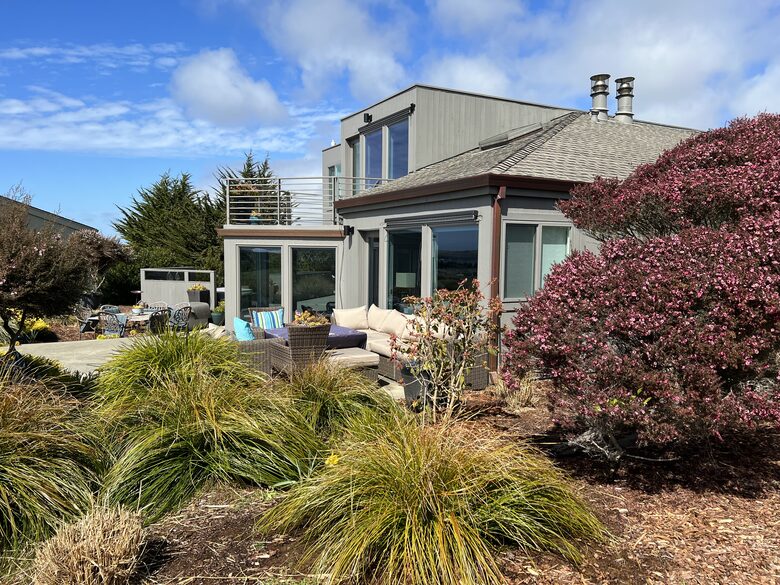Detached bedroom above garage with kitchenette.