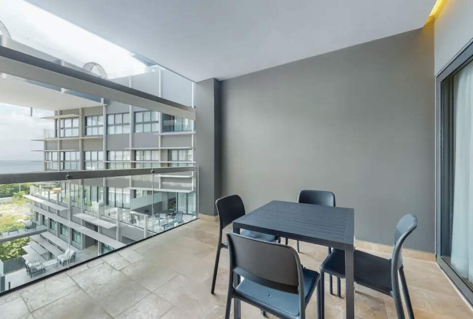 Singular Dreams Modern Beach Condo | Ocean-view with roof deck, pool, & private balcony - walk to beach - Playa del Carmen, Mexico