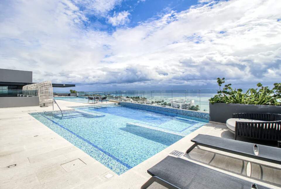 Singular Dreams Modern Beach Condo | Ocean-view with roof deck, pool, & private balcony - walk to beach - Playa del Carmen, Mexico