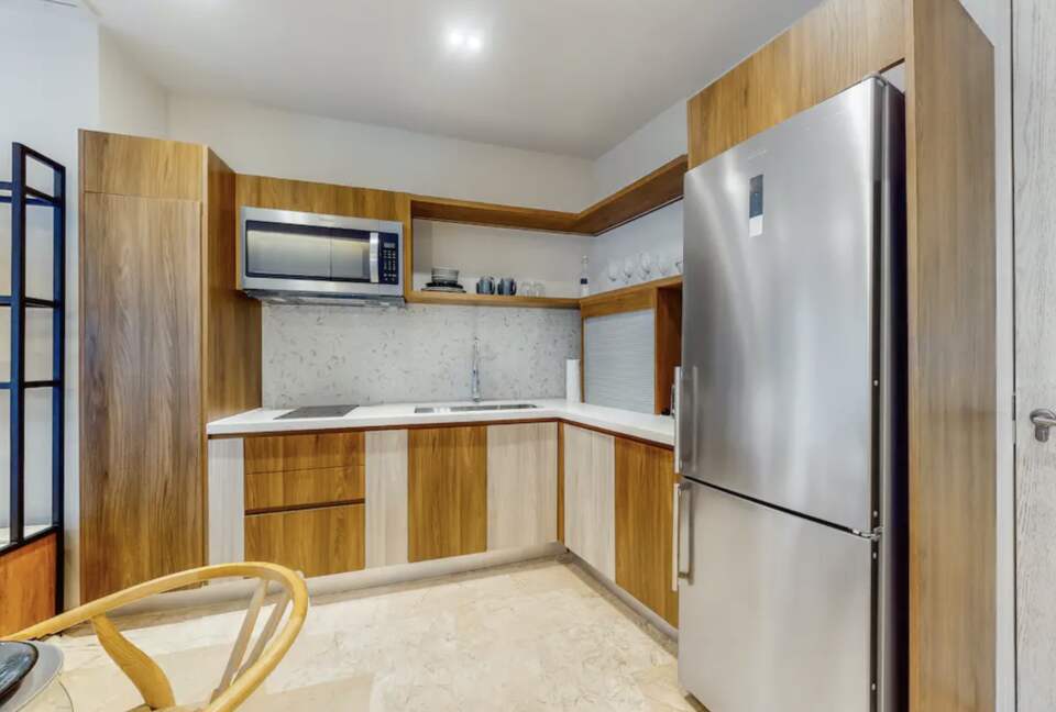 Singular Dreams Modern Beach Condo | Ocean-view with roof deck, pool, & private balcony - walk to beach - Playa del Carmen, Mexico