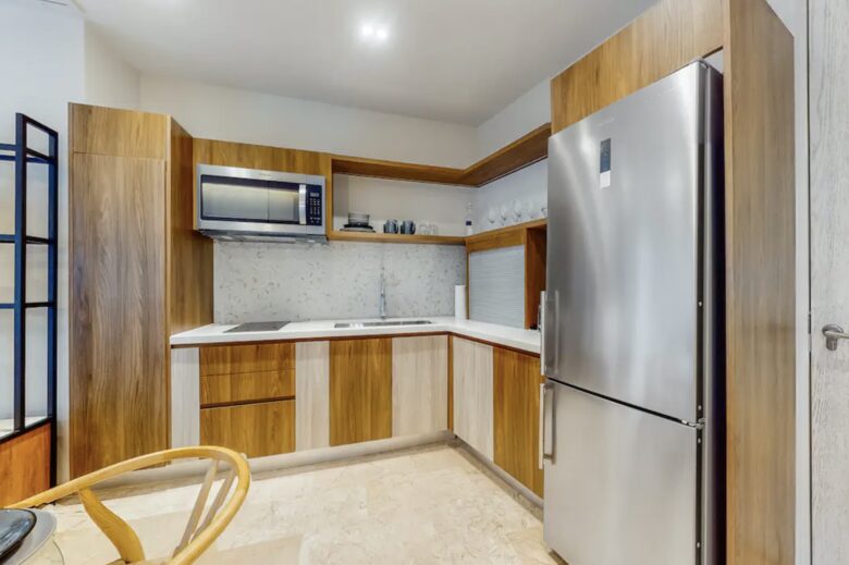 Singular Dreams Modern Beach Condo | Ocean-view with roof deck, pool, & private balcony - walk to beach - Playa del Carmen, Mexico