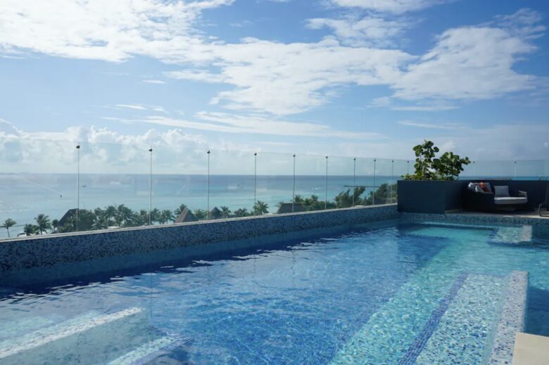 Singular Dreams Modern Beach Condo | Ocean-view with roof deck, pool, & private balcony - walk to beach - Playa del Carmen, Mexico