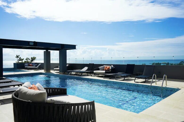 Singular Dreams Modern Beach Condo | Ocean-view with roof deck, pool, & private balcony - walk to beach - Playa del Carmen, Mexico