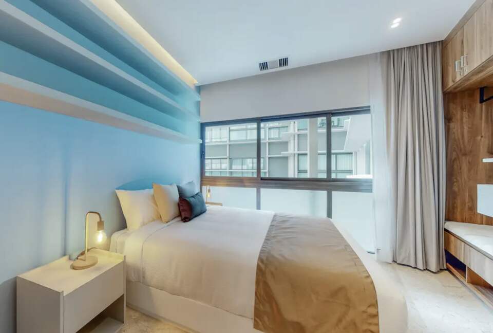 Singular Dreams Modern Beach Condo | Ocean-view with roof deck, pool, & private balcony - walk to beach - Playa del Carmen, Mexico