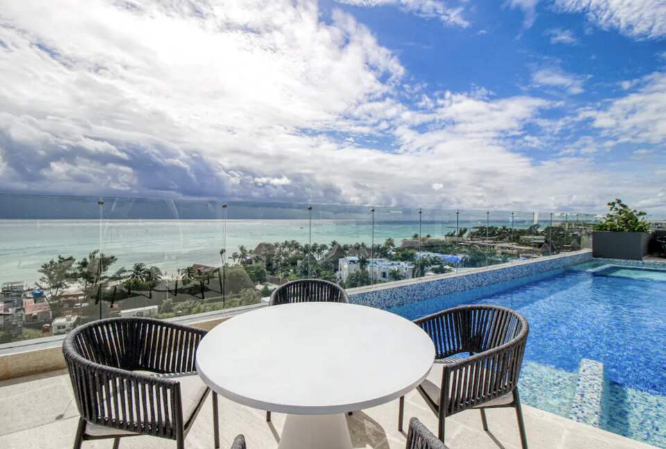 Singular Dreams Modern Beach Condo | Ocean-view with roof deck, pool, & private balcony - walk to beach - Playa del Carmen, Mexico