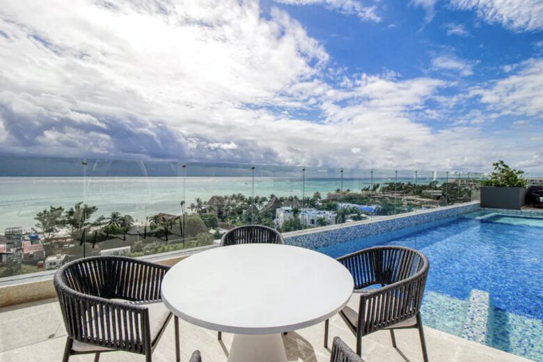 Singular Dreams Modern Beach Condo | Ocean-view with roof deck, pool, & private balcony - walk to beach - Playa del Carmen, Mexico