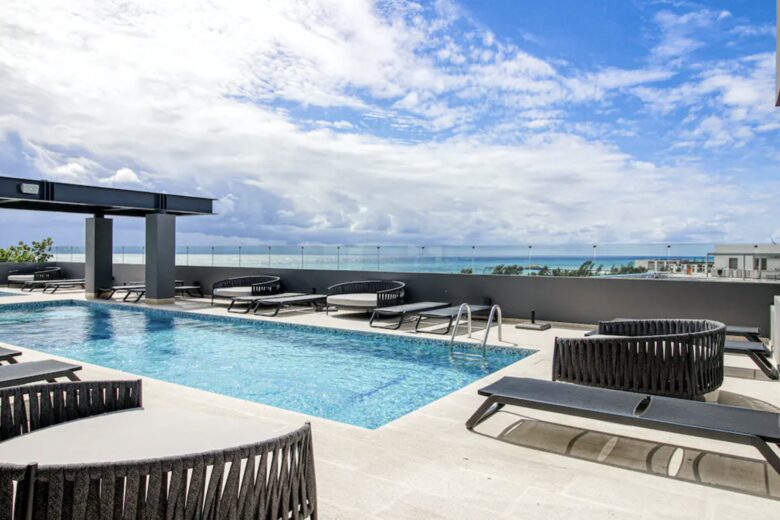 Singular Dreams Modern Beach Condo | Ocean-view with roof deck, pool, & private balcony - walk to beach - Playa del Carmen, Mexico