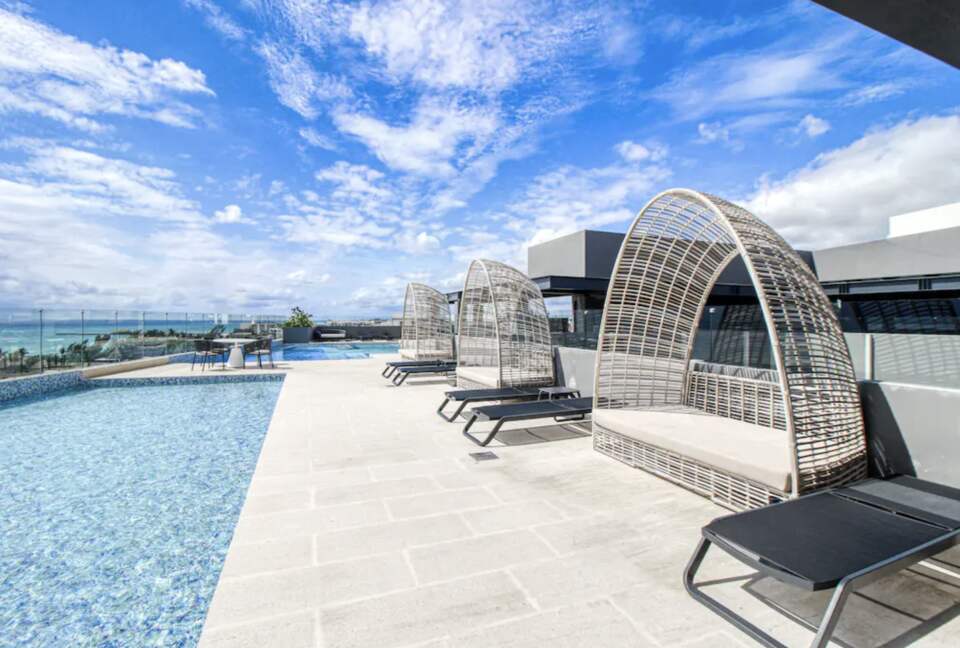 Singular Dreams Modern Beach Condo | Ocean-view with roof deck, pool, & private balcony - walk to beach - Playa del Carmen, Mexico