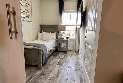 Third room. Twin size bed and twin size rolling under bed..