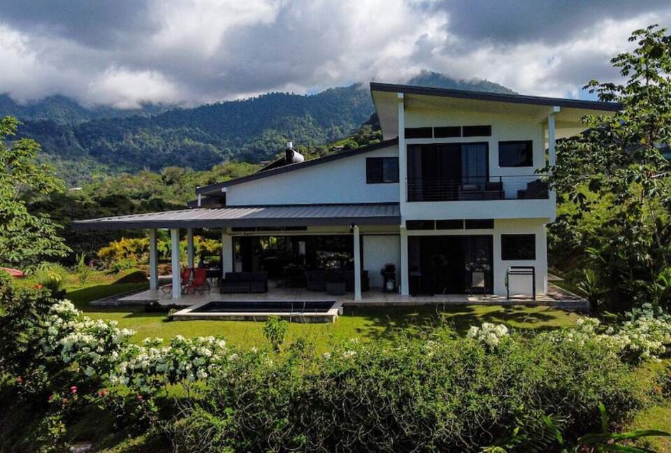 Poolside view of home