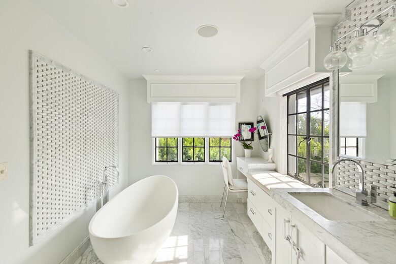Master bathroom with tub and steam shower