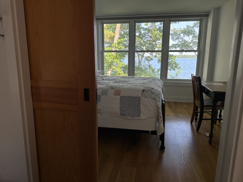 View from second bedroom, looking toward the first bedroom.