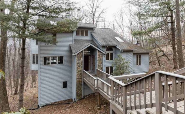 Just steps from a private driveway is the home's entrance.