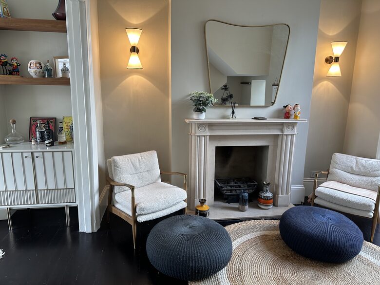 SITTING AREA WITH GAS FIRE PLACE AND GIN CUPBOARD
