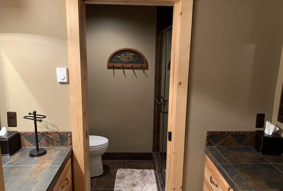 Downstairs bathroom with double vanities