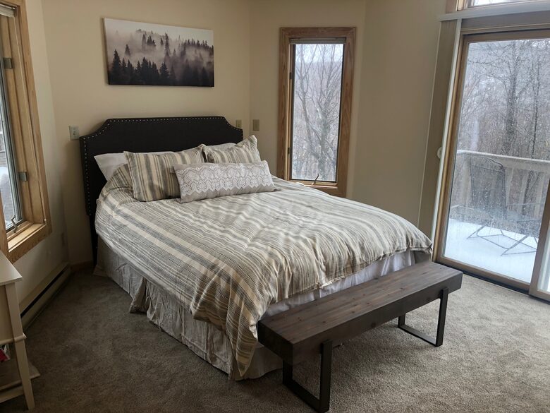Master bedroom on its own floor with bath and private deck.
