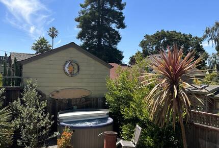 Hot tub and chiminea fireplace area