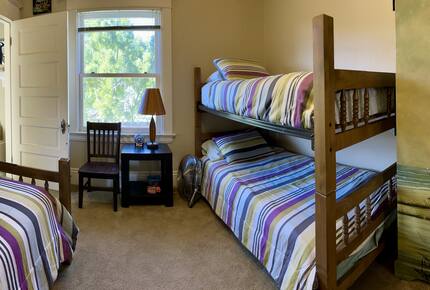 Bunk room (3 twin beds plus linens armoire)