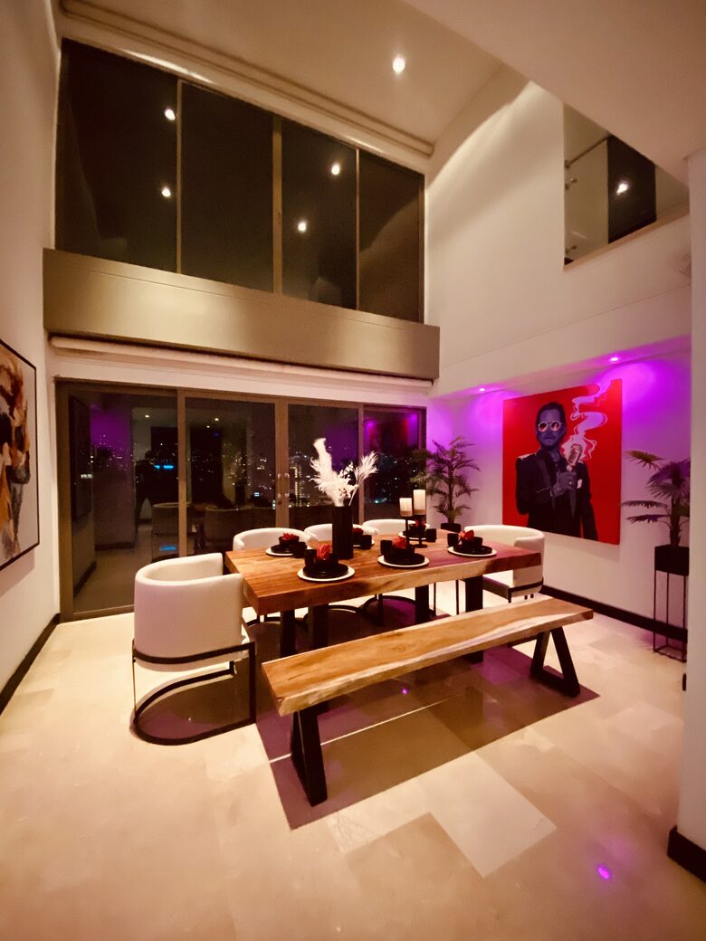 Dining room with double high ceiling