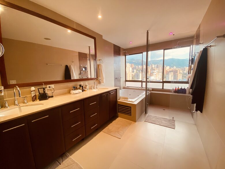 Master bathroom with dual shower and jacuzzi tub