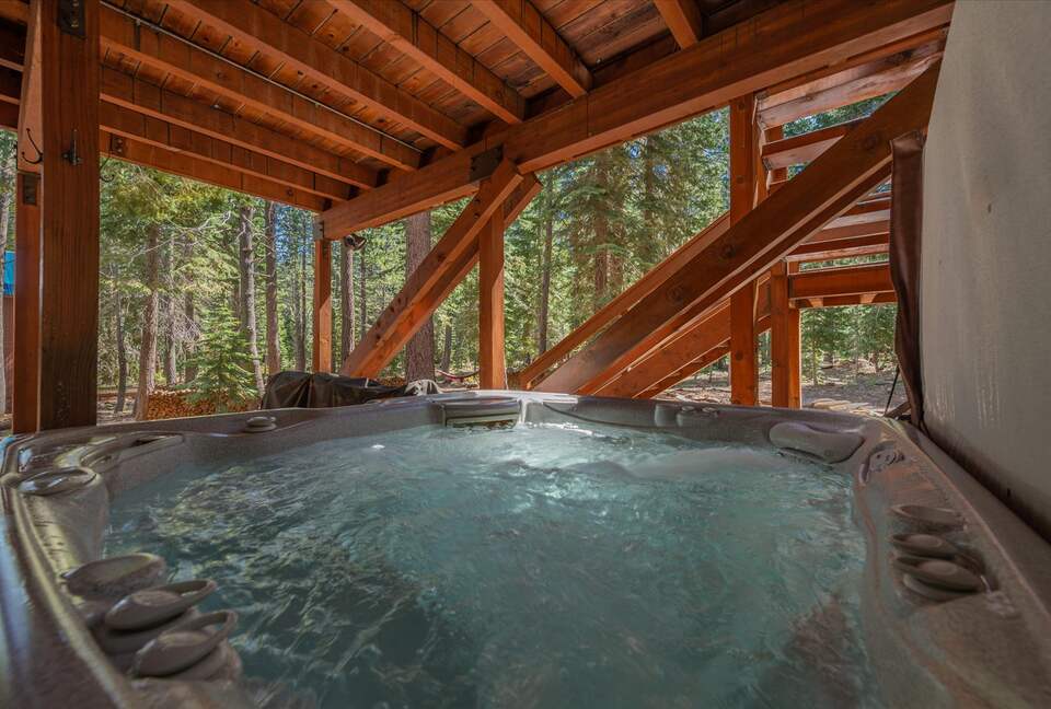 Relax in the hot tub with views of Tahoe National Forest.