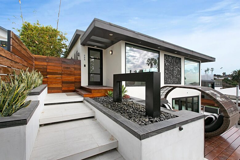 Front of House Water Feature and Daybed Deck w/ Beach View
