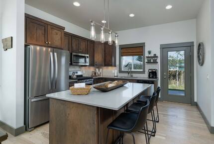 Kitchen opens to back patio