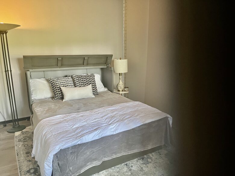 Queen sleeping area in office off of dining room