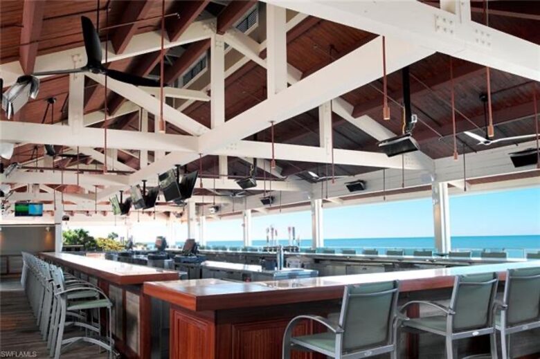 two private beach clubs with restaurants and chair/umbrella service