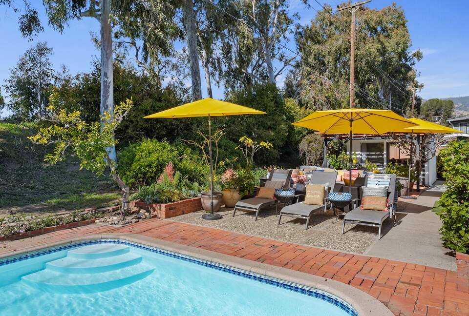 chaise lounges at pool side