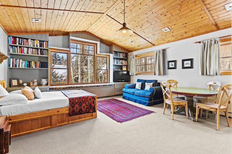 Studio with full bed and full trundle. TV