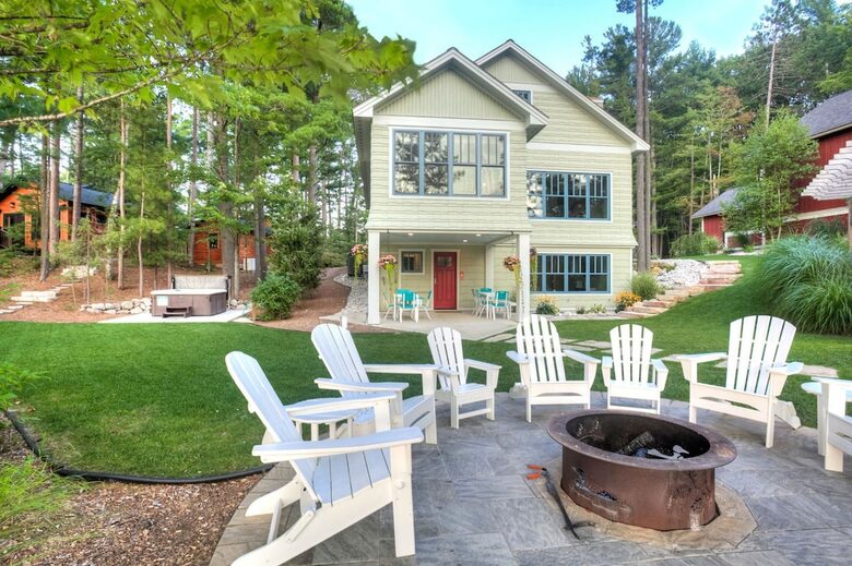Luxury Lakefront Cottage | With Sandy Beach, Hot Tub, SUP, & Dock - Traverse City, Michigan
