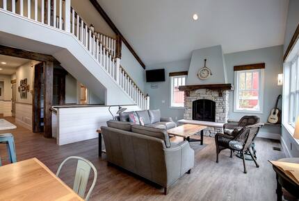 Luxury Lakefront Cottage | With Sandy Beach, Hot Tub, SUP, & Dock - Traverse City, Michigan