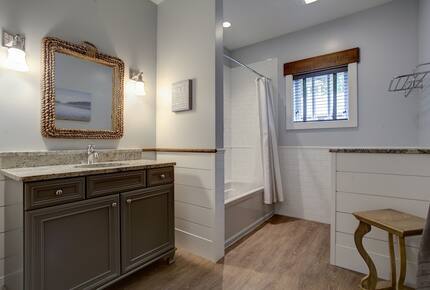 Luxury Lakefront Cottage | With Sandy Beach, Hot Tub, SUP, & Dock - Traverse City, Michigan