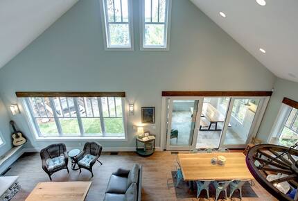 Luxury Lakefront Cottage | With Sandy Beach, Hot Tub, SUP, & Dock - Traverse City, Michigan