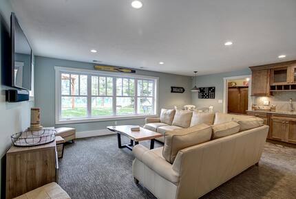 Luxury Lakefront Cottage | With Sandy Beach, Hot Tub, SUP, & Dock - Traverse City, Michigan