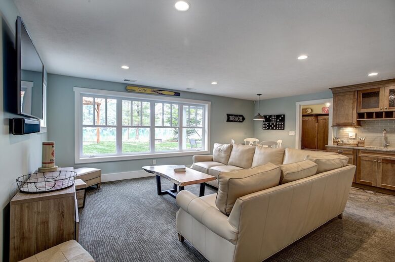 Luxury Lakefront Cottage | With Sandy Beach, Hot Tub, SUP, & Dock - Traverse City, Michigan