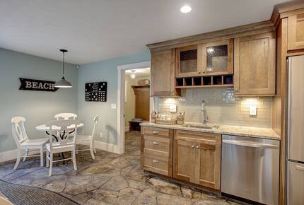 Luxury Lakefront Cottage | With Sandy Beach, Hot Tub, SUP, & Dock - Traverse City, Michigan