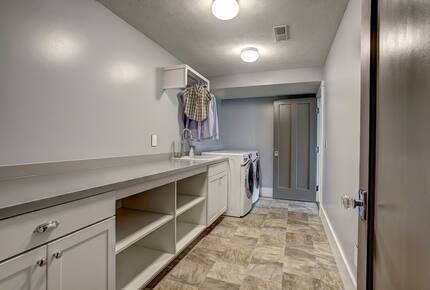 Luxury Lakefront Cottage | With Sandy Beach, Hot Tub, SUP, & Dock - Traverse City, Michigan