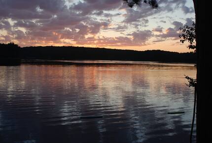 Luxury Lakefront Cottage | With Sandy Beach, Hot Tub, SUP, & Dock - Traverse City, Michigan