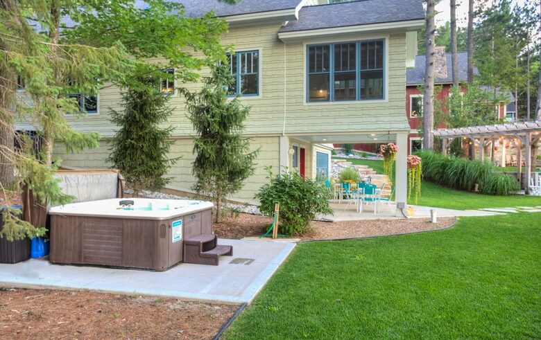 Luxury Lakefront Cottage | With Sandy Beach, Hot Tub, SUP, & Dock - Traverse City, Michigan