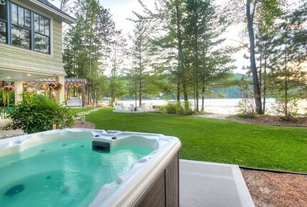 Luxury Lakefront Cottage | With Sandy Beach, Hot Tub, SUP, & Dock - Traverse City, Michigan