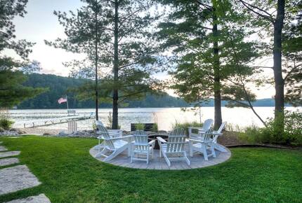 Luxury Lakefront Cottage | With Sandy Beach, Hot Tub, SUP, & Dock - Traverse City, Michigan