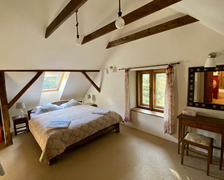 Upstairs master bedroom with gorgeous view of forest, fields