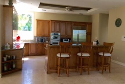 Bonita Bay Estate Home with glass walled dining room overlooking 10,000 gallon pond. - Bonita Springs, Florida