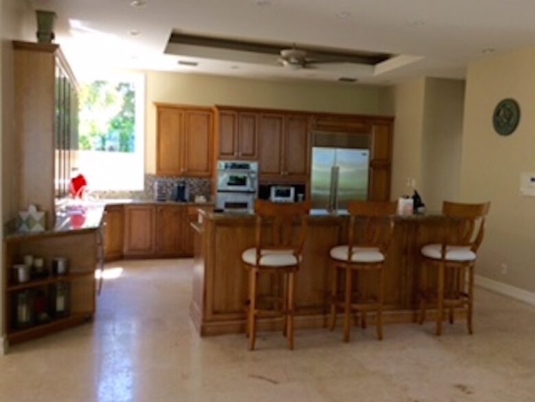 Bonita Bay Estate Home with glass walled dining room overlooking 10,000 gallon pond. - Bonita Springs, Florida